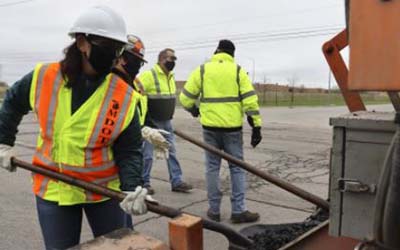 Governor Whitmer Fills Potholes with Road Commission 